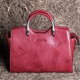 Elegant Leather Winged Tote – Women’s Full-Grain Handbag with Metal Top Handles & Compartments